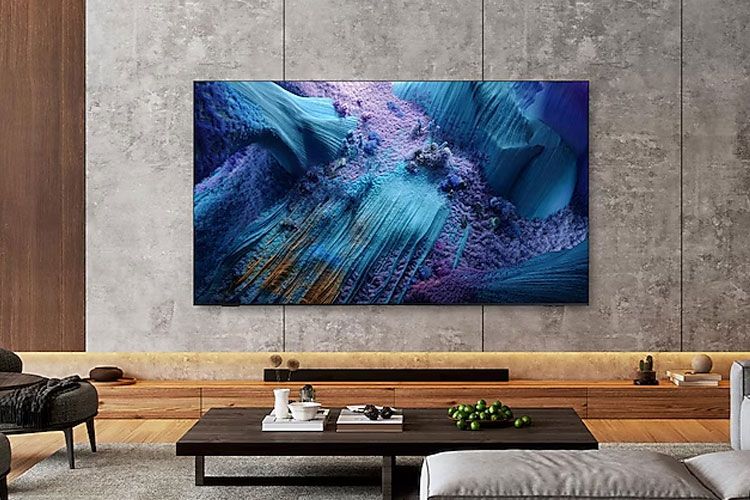 Modern living room with large screen TV and soundbar